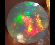 ROUND FACETED OPAL 1.05 CT WELO