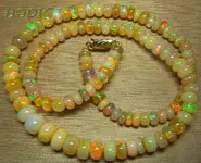 COLLIER OR 18 K PERLES OPALES ETHIOPIE
