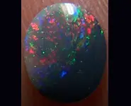 SOLID BLACK OPAL 0.65 CT AUSTRALIA