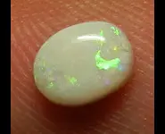 WHITE OPAL 0.50 CT AUSTRALIA L. RIDGE