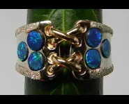 BAGUE OR 18 CARATS OPALES DOUBLET