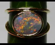 BAGUE OPALE NOIRE OR 18 CARATS AUSTRALIE