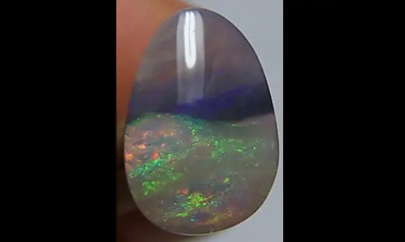 SOLID BLACK OPAL 0.75 CT AUSTRALIA