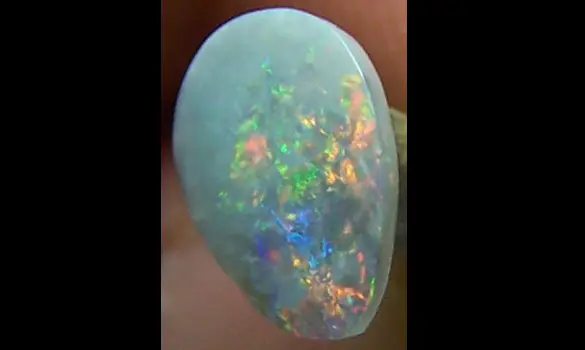 SOLID OPALE DARK 0.65 CT AUSTRALIE