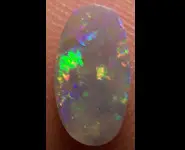 SOLID OPALE DARK 0.65 CT AUSTRALIE