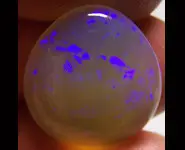 SOLID OPALE CRISTAL 14.60 CT L. RIDGE