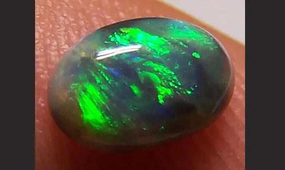 SOLID BLACK OPAL 0.75 CT L. RIDGE