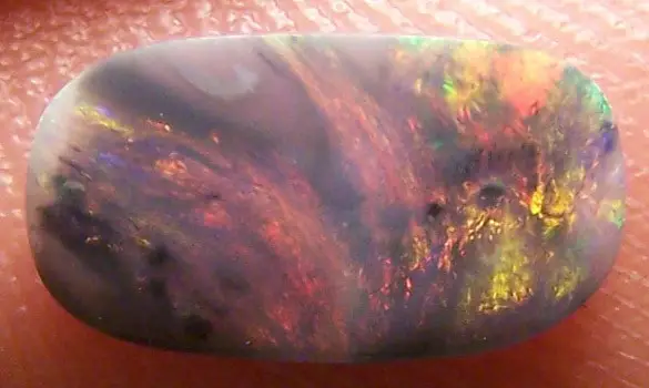 SOLID OPALE NOIRE 0.80 CT L. RIDGE