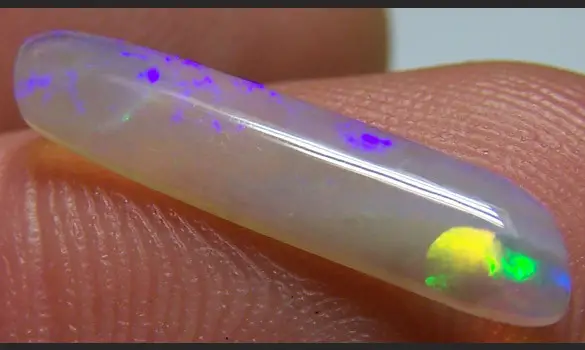 SOLID OPALE CRISTAL 1.25 CT L. RIDGE