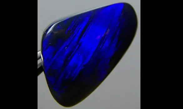 SOLID BLACK OPAL 7.75 CT L. RIDGE