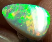 SOLID BLACK OPAL 0.65 CT L. RIDGE