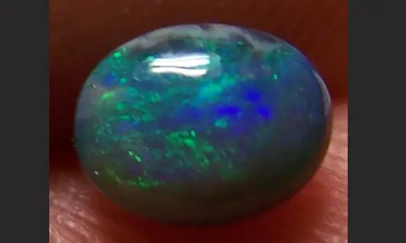 SOLID BLACK OPAL 0.70 CT AUSTRALIA