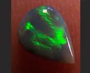 SOLID DARK OPAL 0.45 CT MINTABIE