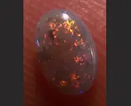 SOLID CRYSTAL OPAL 0.35 CT MINTABIE
