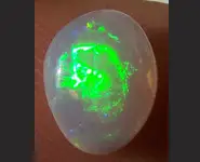 SOLID OPALE CRISTAL 1.10 CT L. RIDGE