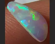 SOLID OPALE CRISTAL 0.45 CT L. RIDGE