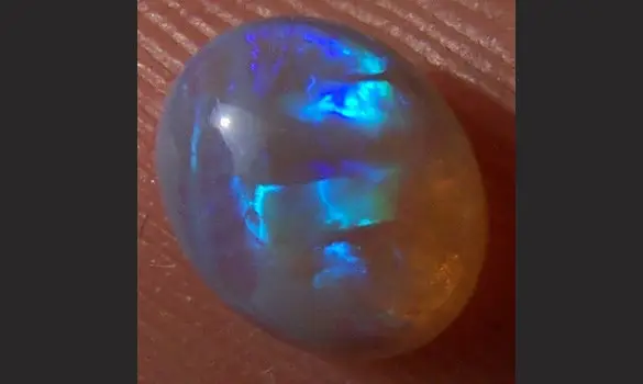 SOLID CRYSTAL OPAL 0.90 CT L. RIDGE