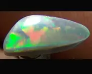 SOLID BLACK OPAL 0.85 CT L.RIDGE