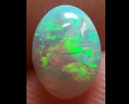 SOLID DARK OPAL 0.80 CT L. RIDGE
